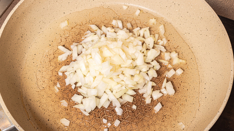 diced onion in pan