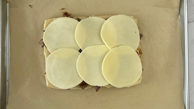 sliced provolone on bread