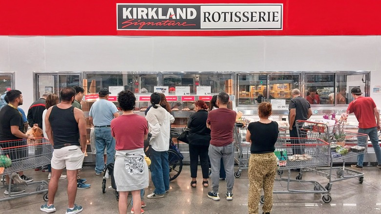 shoppers waiting for Costco rotisserie chicken