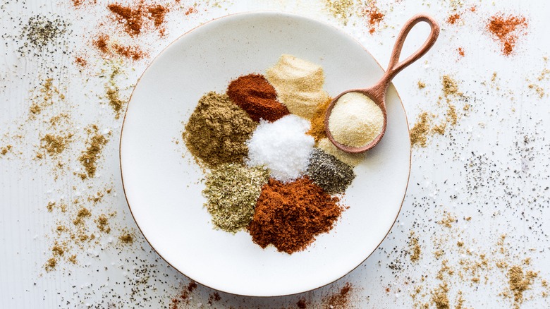 Assorted seasonings in white bowl