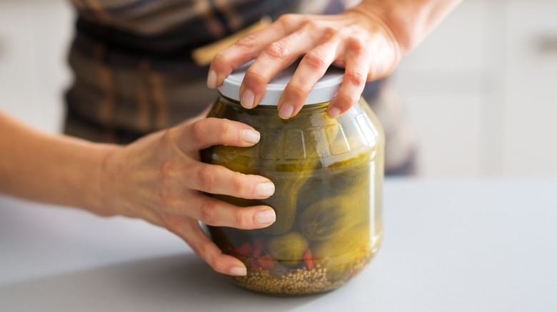 Jar of pickles in brine