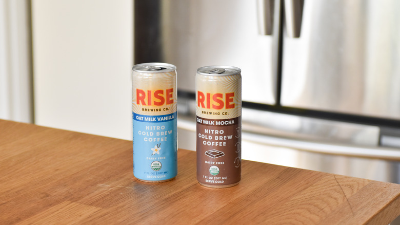 Two cans of Rise Coffee 