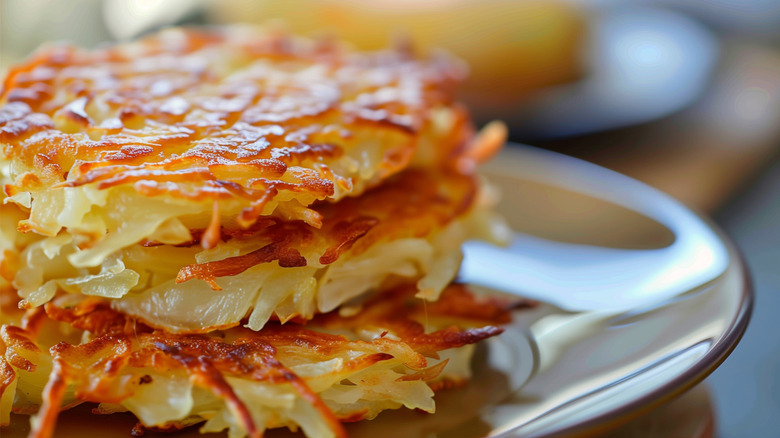 Hash browns on plate on counter