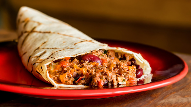 microwaved burrito on plate