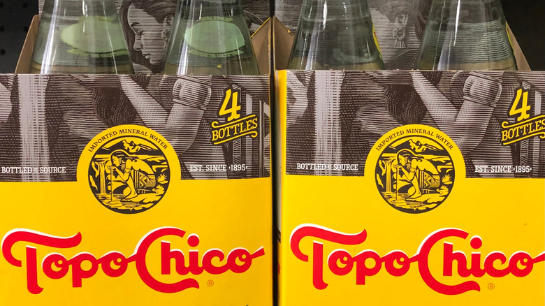 cases of topo chico water 