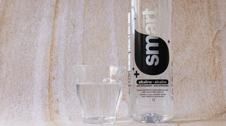 Smartwater and glass cup