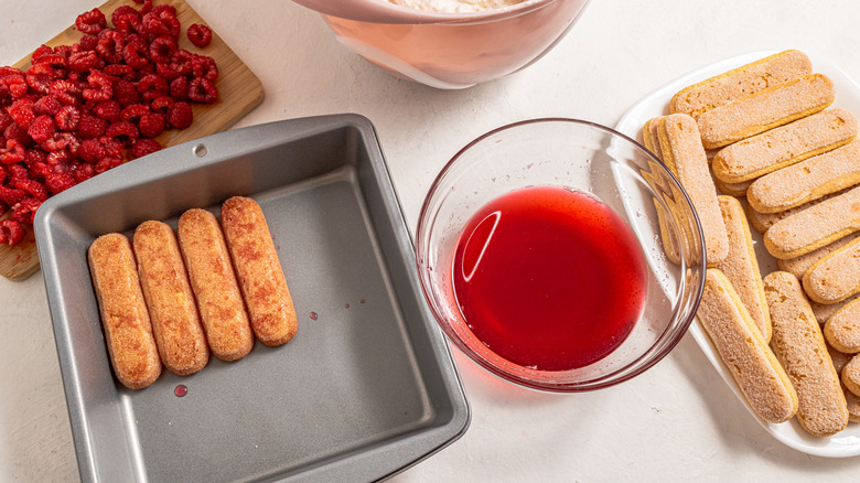 Arranging ladyfingers in a dish