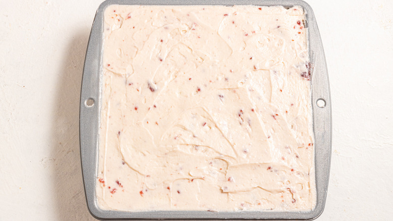 Raspberry mascarpone cream spread evenly in a dish