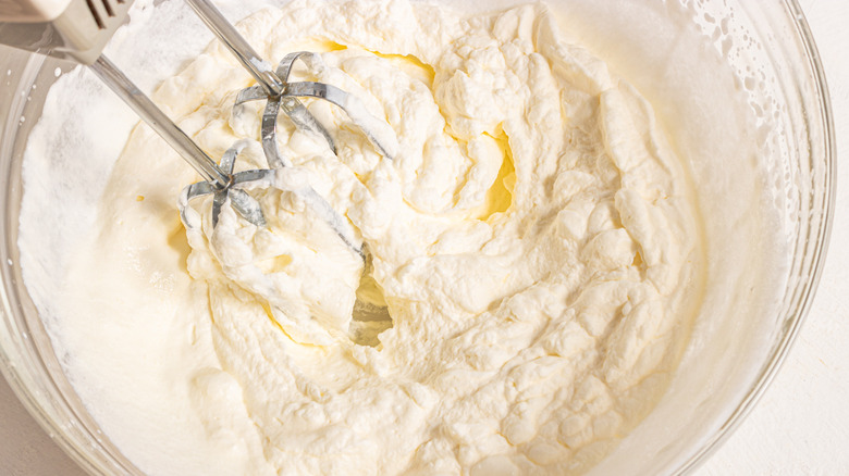 Whipping heavy cream in a bowl