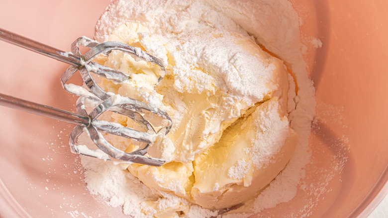 Beating mascarpone and podered sugar