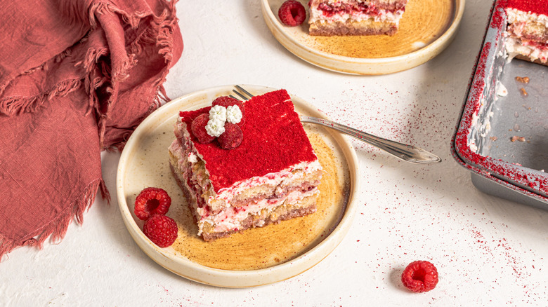 Slice of raspberry tiramisu on a plate