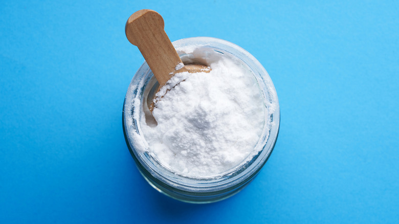 spoon in baking soda