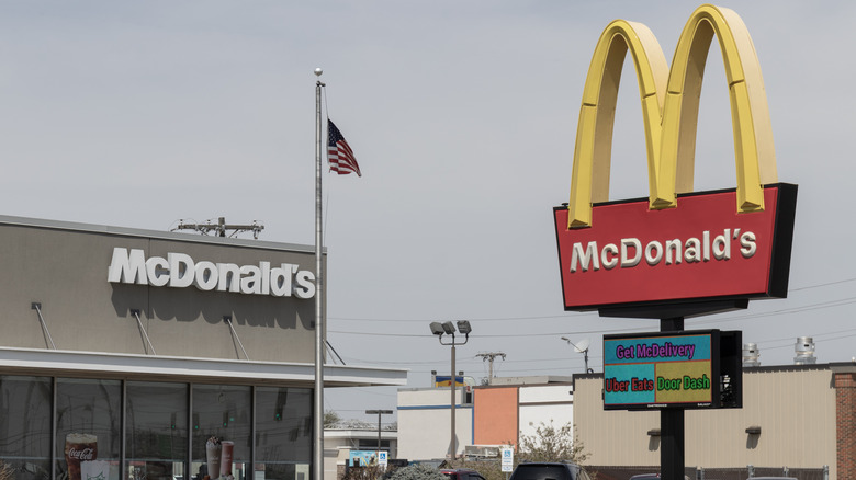 Outside of a McDonald's restaurant with sign of the golden arches