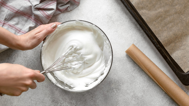 mixing whipped cream with whisk