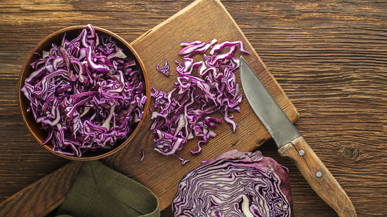 chopped red cabbage on cutting board