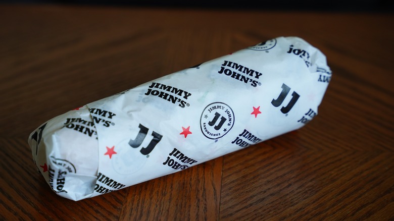 Wrapped Jimmy John's sub sandwich on table