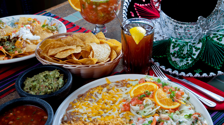 Plates, chips, and dips at Mexican restaurant