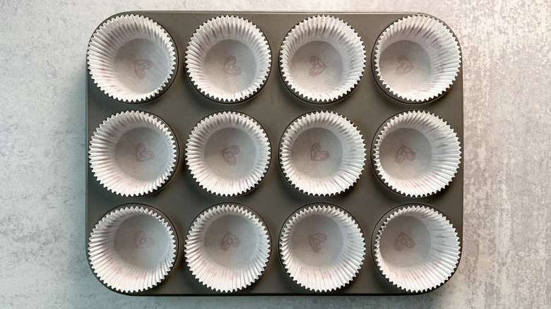 Muffin tin lined with papers