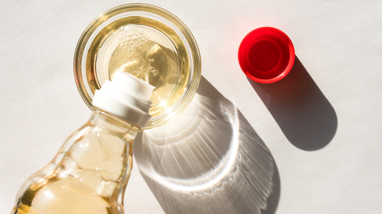 pouring rice wine vinegar into bowl