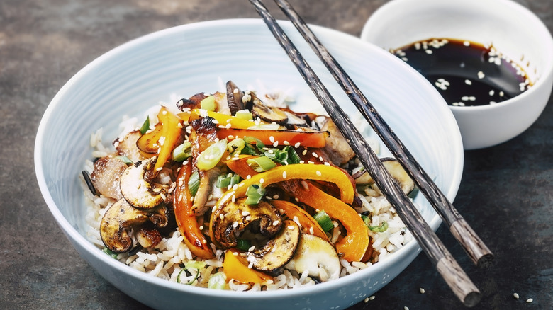 stir fried dish served with dipping sauce