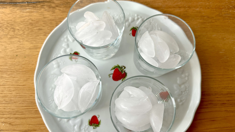 drinking glasses filled with ice