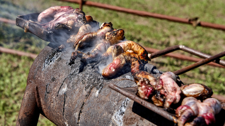 Rocky Mountan oysters cooking on a charcoal burner