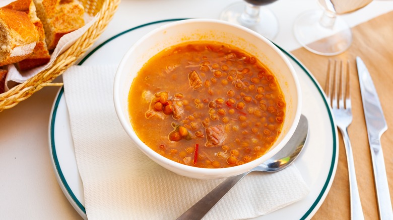 Lentil stew with salt pork in a bowl