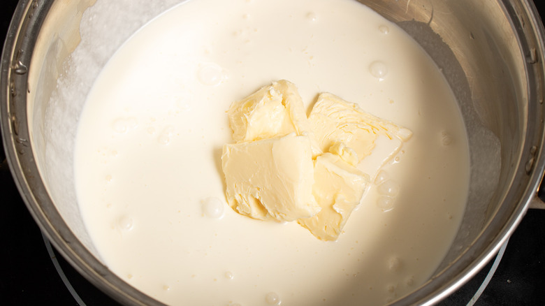 Cream and butter in saucepan