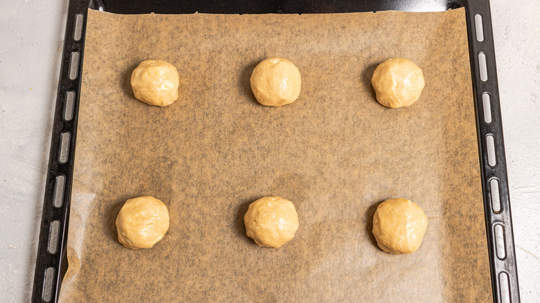 cookie dough balls on sheet