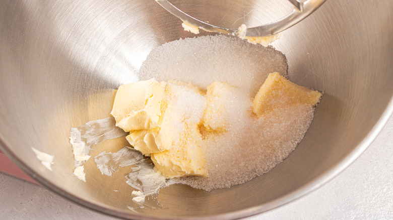 Butter and sugar in a bowl