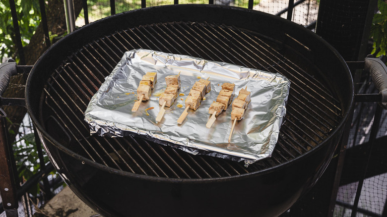 satay skewers on grill