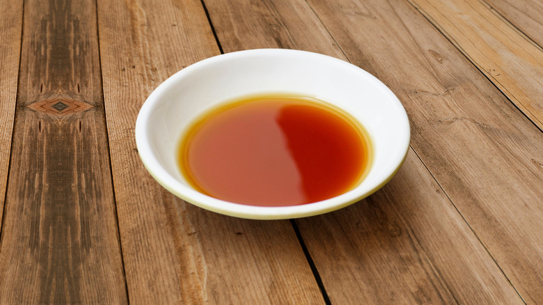 Brown sauce in small bowl