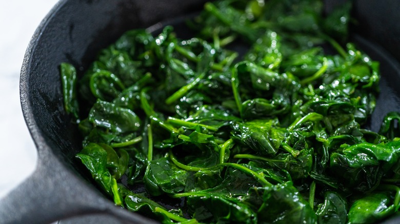 Sauteed spinach in cast iron skillet