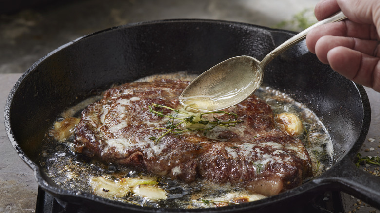 Basting steak in butter