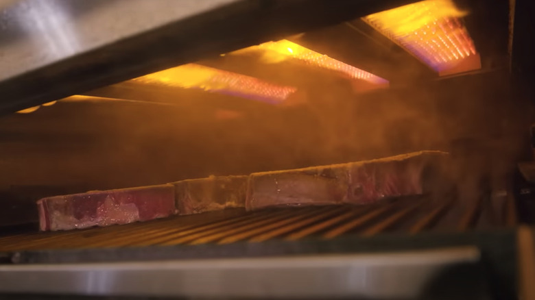 Steaks in a broiler