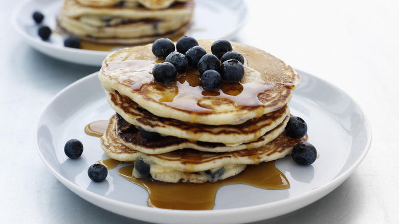 Blueberry pancakes on plates