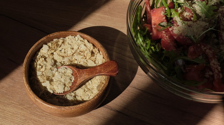 Nutritional yeast in wooden bowl