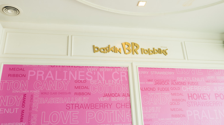 walls of a Baskin-Robbins store featuring the names of many flavors