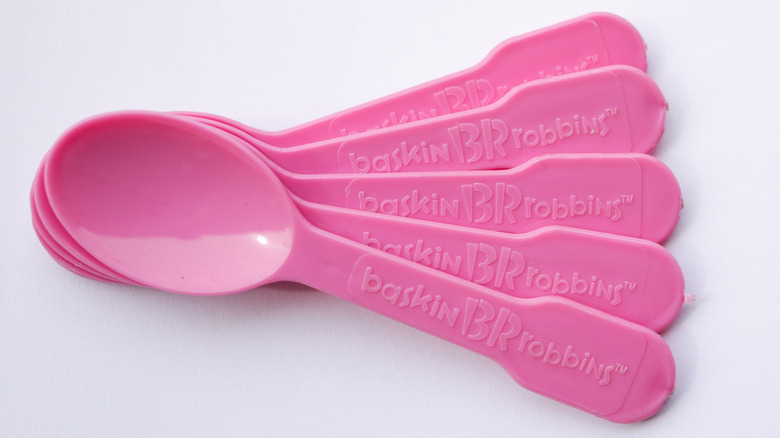 Stack of pink plastic spoons from Baskin-Robbins