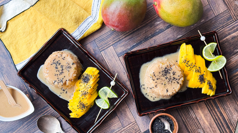 Shortcut mango sticky rice on plates with lime garnish