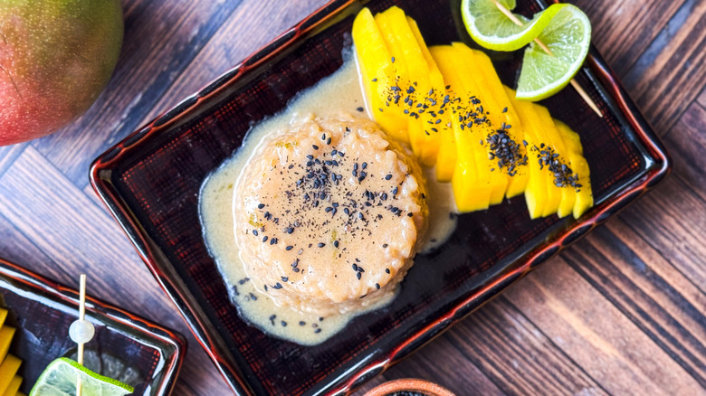 Shortcut mango sticky rice on plate with lime garnish