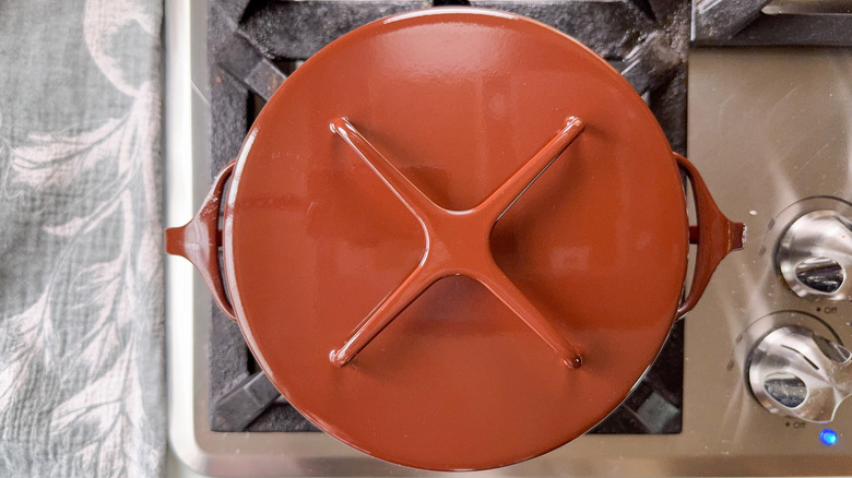 Brown covered pot on stovetop