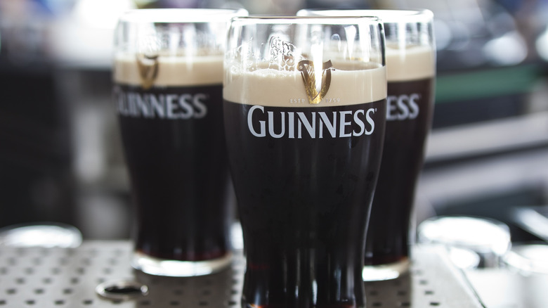 Three glasses of Guinness Draught Stout