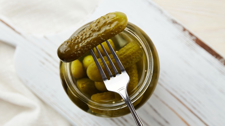 Pickle on fork ready for tasting