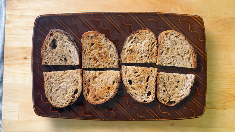 Rye bread toasts on serving platter