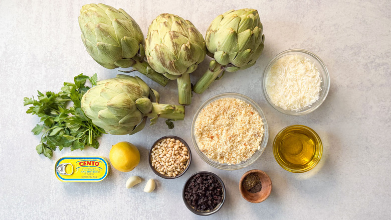 Sicilian-style stuffed artichokes ingredients on countertop