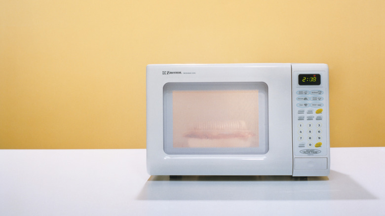 white microwave on counter