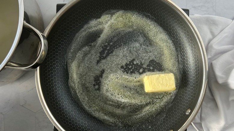 butter melting in pan
