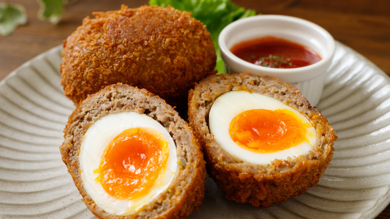 Scotch eggs on a plate