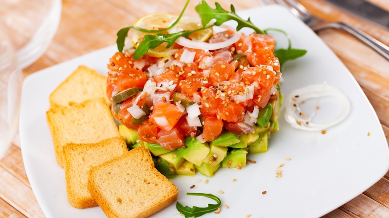 Salmon tartare on diced avocado